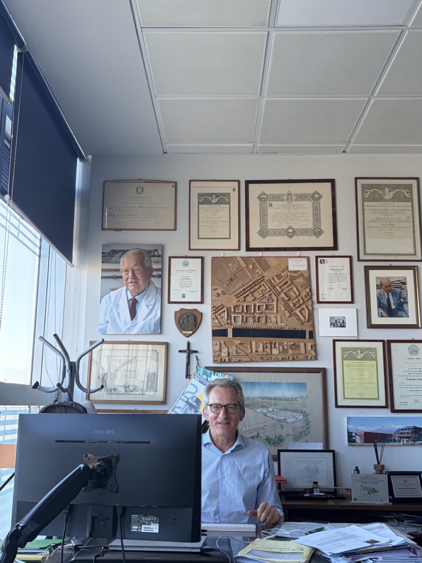 Jacopo's father at his desk in the family studio